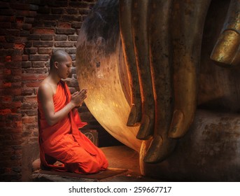 Buddhism Monk Sit In The Temple In Thailand.