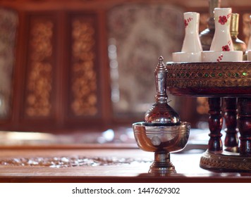 Buddhism Ritual Utensils Made Of Solid Brass For Ceremony Use In A Temple Authentic Shot With Blur Temple Indoor Environment Background 