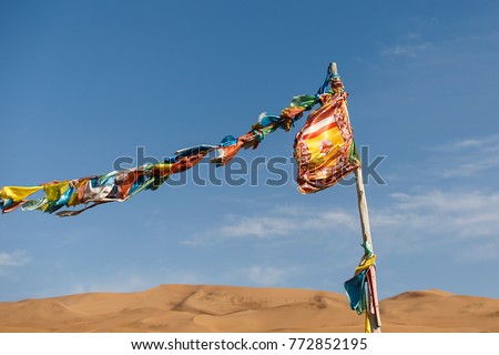 Similar – buddhistische banner auf dem badainsee miao, china