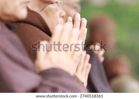 Buddhist Devotees in Prayerful Gesture
