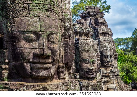 Buddhist faces on towers at Bayon Temple, Cambodia.