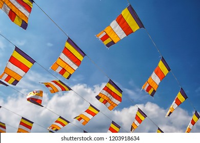 Buddhist Flag with blue sky - Powered by Shutterstock