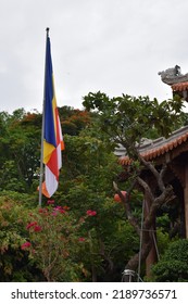 Buddhist Flag In A Vietnamese Temple.