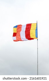 Buddhist Flag Waving In The Sky