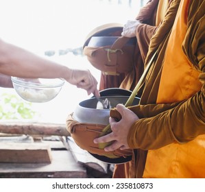 Buddhist monk Food offerings Thai traditional culture Asia culture - Powered by Shutterstock