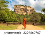 Buddhist monk at  Lion Rock in Sigiriya, Sri Lanka