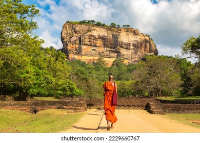 Buddhist monk at  Lion Rock in Sigiriya, Sri Lanka
