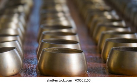 Buddhist Monk's Brass Begging Bowl In Rows For Giving Donation