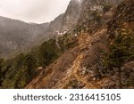 Buddhist nunnery in the mountains during snowfall, Kila nunnery, between Paro and Haa, Himalayan region, Bhutan