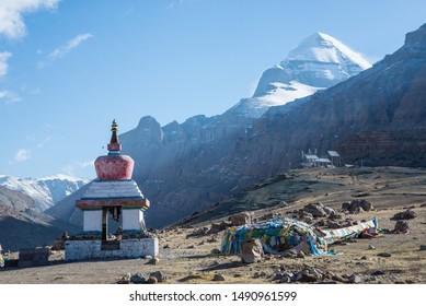 The Buddhist stupa the Enlightenment symbol on the mountain valley during the ritual kora (yatra) around sacred Mount Kailash. Ngari scenery in West Tibet. Sacred place for Buddha pupils.