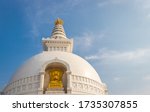 buddhist stupa isolated with amazing blue sky from unique perspective image is taken at Vishwa Shanti Stupa Rajgir in Bihar india. This stupa is symbol of world peace.