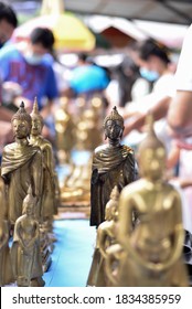 Buddhists Make Merit, Pay Coins In The Monk Bowls In Temple . Selective Focus.
