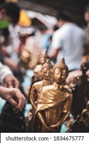 Buddhists Make Merit, Pay Coins In The Monk Bowls In Temple . Selective Focus.
