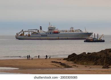 Bude, Cornwall, UK - July 2 2021: Cable Laying Ship Responder With Support Vessel Near The Coast Waiting To Complete The Undersea Cable (grace Hopper) Project.