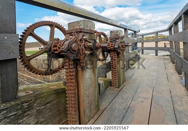 Bude, Devon, UK, September\
22nd, 2022, the rack and pinion paddle gear used to open the lock\
gates on the canel. These are situated on the walkway across the\
lock. 