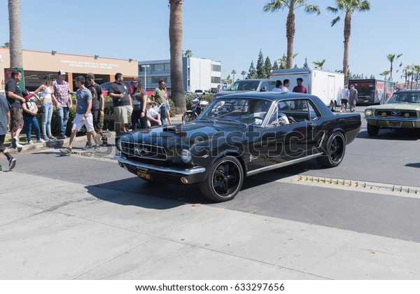 Buena Park, USA\
- April 30, 2017: Black Ford Mustang 1st generation on display\
during the Fabulous Fords\
Forever