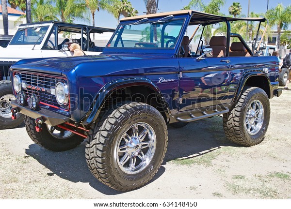 BUENA PARK/CALIFORNIA - APRIL 30, 2017: Vintage Ford\
Bronco parked at a gathering of similar cars and trucks in Buena\
Park, California USA 