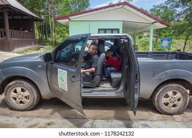 Bueng Kan, Thailand - May, 2018 : Tourists Taking A Travel Service Truck To Visit The Whale-Shaped Rock At Phu Sing Mountain