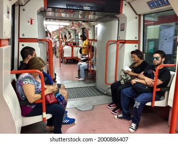 BUENOS AIRES, ARGENTINA - 10.02.2016: Passengers Inside Of The Carriage Of Buenos Aires Subway. Peak Hour, Busy Train. Selective Focus. Horizontal