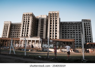 Buenos Aires, Argentina - April 20, 2013: Children Play In Front Of The Abandoned Building Known As 