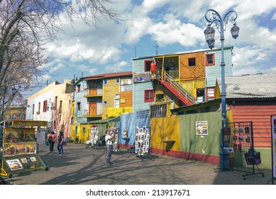 BUENOS AIRES, ARGENTINA - AUGUST 21, 2014: Historical tenement house besides Caminito street on August 21, 2014 in La Boca, Buenos Aires, Argentina. Nowadays functions as a complex of shops and bars.