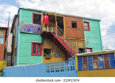 BUENOS AIRES, ARGENTINA - AUGUST 21, 2014: Historical tenement house besides Caminito street on August 21, 2014 in La Boca, Buenos Aires, Argentina. Nowadays functions as a complex of shops and bars.