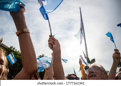 Buenos Aires, Argentina, December 7, 2019: People With Argentine Flags At The Farewell To President Mauricio Macri In The Plaza De Mayo.