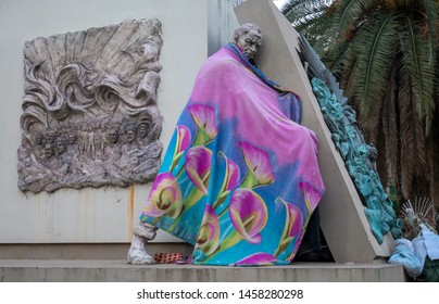 Buenos Aires, Argentina, July 13, 2019. Statue Of Juan Domingo Perón In The City Of Buenos Aires, Argentina.  
They Live Homeless Under A Monument. Financial Crisis In Argentina At Election Time.