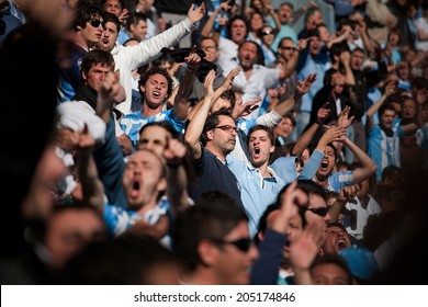 BUENOS AIRES, ARGENTINA - JULY 13, 2014: Soccer fans on the streets of Buenos Aires at the final game of World Cup 2014 between Argentina and Germany. July 13, 2014, Buenos Aires, Argentina