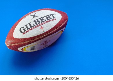 Buenos Aires, Argentina, July 8, 2021. Gilbert Rugby Ball Isolated On A Blue Background.