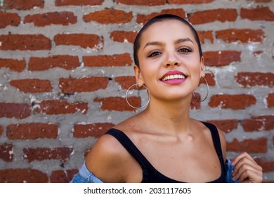 Buenos Aires, Argentina - November 18th, 2020: Beautiful Young Buzzcut Female Model In Urban Shoot.