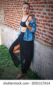 Buenos Aires, Argentina - November 18th, 2020: Beautiful Young Buzzcut Female Model In Urban Shoot.