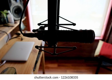 Buenos Aires, Argentina - November, 6th, 2018. Microphone In A Recording Room With Some Gear In The Background. Vocals Recording Home Studio