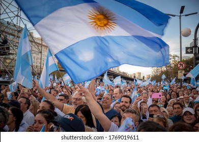 Buenos Aires, Argentina - October 19, 2019: Crowd Of People With Argentine Flags And Cell Phones In The March For The Government Of Mauricio Macri