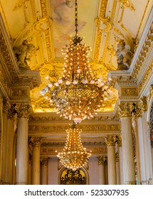 BUENOS AIRES, ARGENTINA - OCTOBER 26 2013   Ornate, gold chandeliers in the ceiling of In the opera house building
