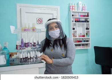 Buenos Aires, Argentina - September 17th 2020: Woman With A Face Mask Attending A Nail Salon During The Covid 19 Pandemic. Urban Photo Shot. 