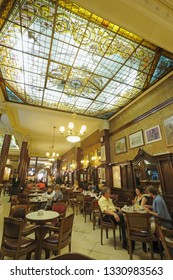 Buenos Aires, Avenida De Mayo, Argentina - March, 14, 2010: Interior View With People Of Café Tortoni The Oldest Coffee Shop In The City