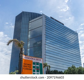 Buenos Aires, Costanera; November 22, 2019: new business building, reflecting the sky, with detour sign