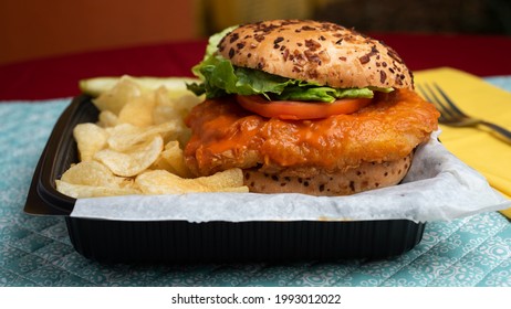 Buffalo Chicken Sandwich with potato crisps or chips