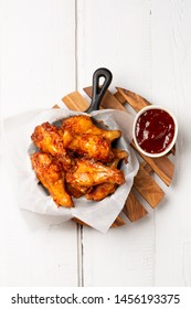 Buffalo Chicken Wings On White Wooden Background Top View