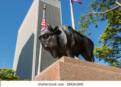 BUFFALO, NEW YORK - JUNE 3, 2015: Statue of a Buffalo in front of the One M&T Plaza building in Buffalo, New York.