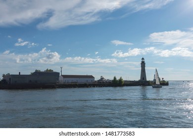 Buffalo, NY, USA, 09-16-2019: Lighthouse And Other Building Seen In Harbor