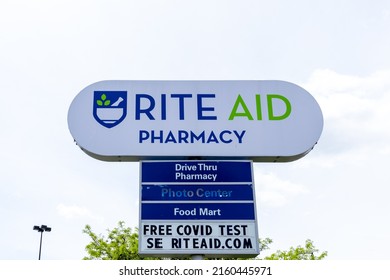 Buffalo, NY, USA - May 23, 2022: Closeup of Rite Aid store sign with blue sky in background in Buffalo, NY, USA. Rite Aid Corporation is an American drugstore chain.