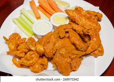 Buffalo Shrimp, Chicken Strips And Wings