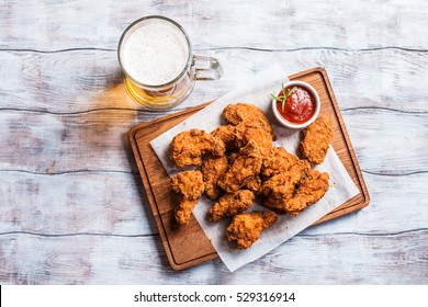 Buffalo Style Chicken Wings Served With Cold Beer, Top View With Copy Space