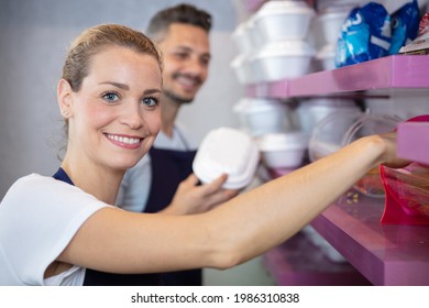 Buffet Female Worker Servicing Food In Cafeteria