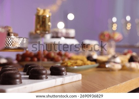 Buffet menu. Different delicious desserts on table, selective focus