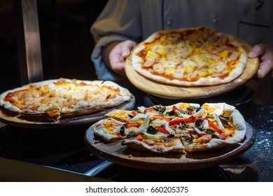 Buffet Pizza Italian Style ,chef Serving Pizza