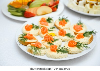 Buffet table with fruit and meat snacks and canapés - Powered by Shutterstock