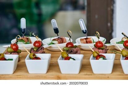 Buffet Table On A Wedding With Canapes, Snacks, Appetizers, Refreshments, Entrees